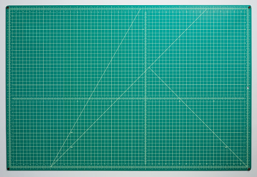Green Professional Cutting Mat. Drawing and Cutting Rubber Surface. Top View with Copy Space.