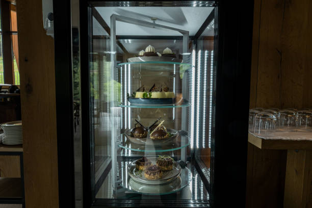 Good looking cakes in showcase refrigerator