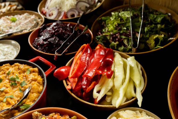 istock Different types of salads with vegetables 1255644941