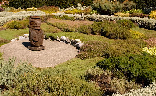 Beautiful herb garden in Government House, Victoria, B.C., with a sundial centre piece.