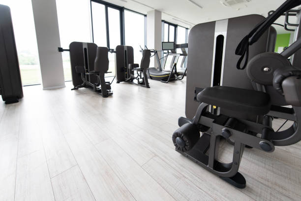 istock Modern Gym Interior With Equipment 1255650972