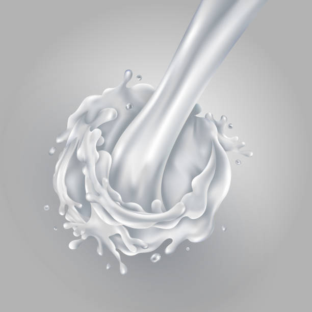 istock Stream of pouring milk on a gray background 1255652373