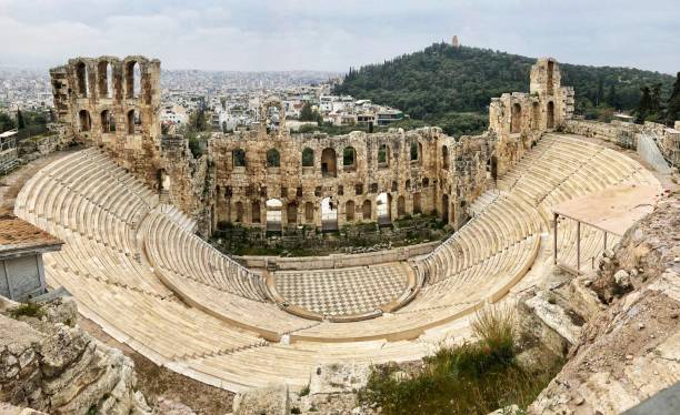 Athens in the backdrop of the Acropolis theatre This theatre was first built in 161 AD ancient greece stock pictures, royalty-free photos & images