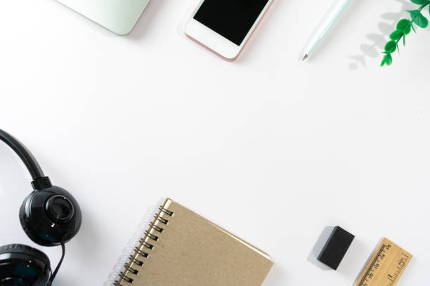 istock Flat lay, top view office table desk. Workspace with blank copy space supplies decorate as frame on white or color pastel background. 1255662940