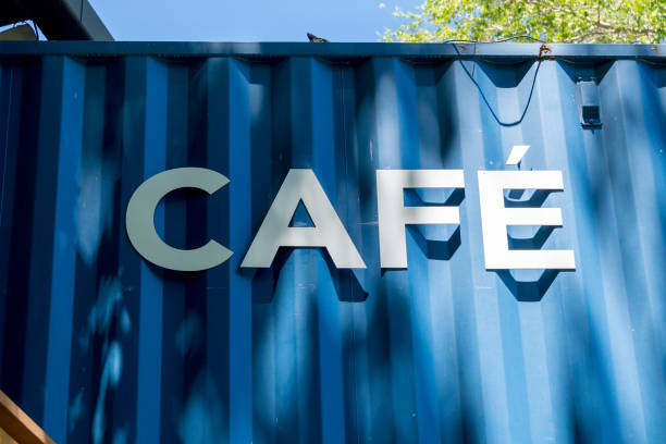 istock Cafe Sign on Metal Wall in Public Park 1255662987