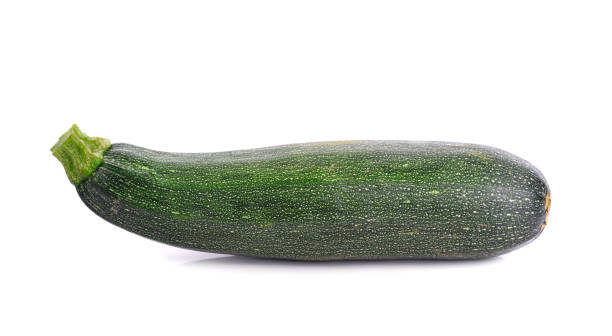 istock Zucchini cucumber isolated on white 1255669806