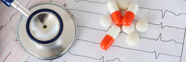 istock Medical stethoscope head lying on cardiogram chart 1255671901