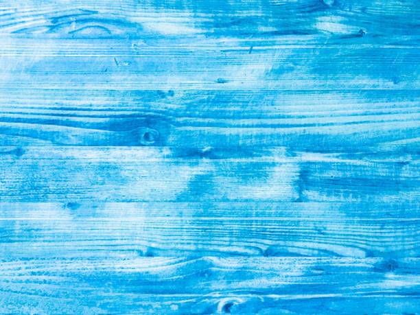 istock wood blue background, washed wooden abstract texture 1255671923
