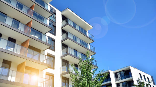 istock Modern apartment buildings on a sunny day with a blue sky. 1255680130
