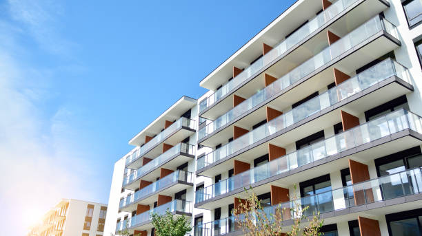 istock Modern apartment buildings on a sunny day with a blue sky. 1255680154