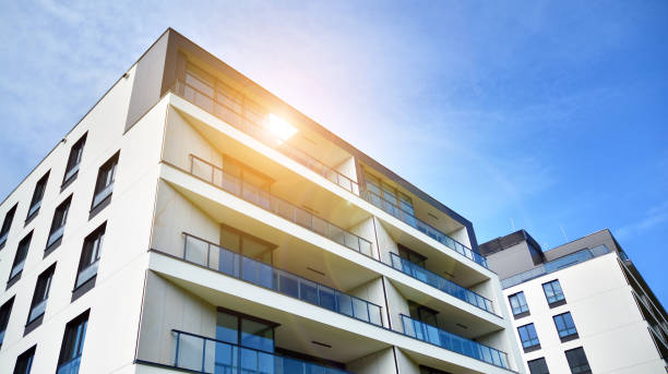 istock Modern apartment buildings on a sunny day with a blue sky. 1255680224