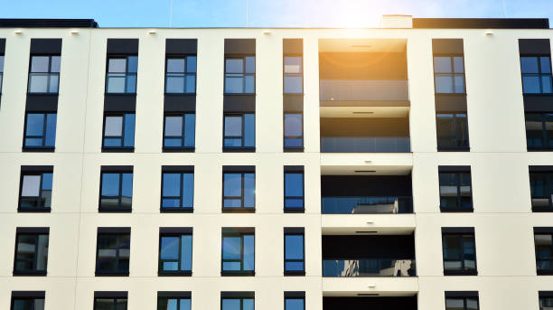 istock Modern apartment buildings on a sunny day with a blue sky. 1255680227