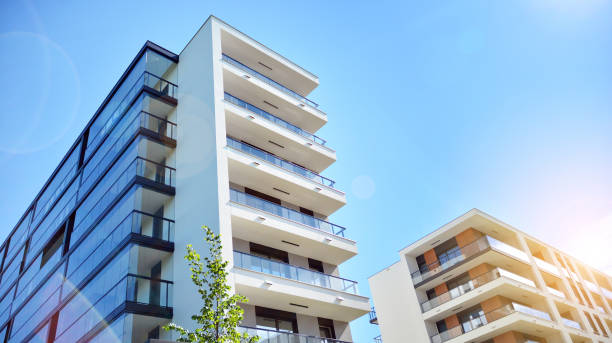 istock Modern apartment buildings on a sunny day with a blue sky. 1255680234