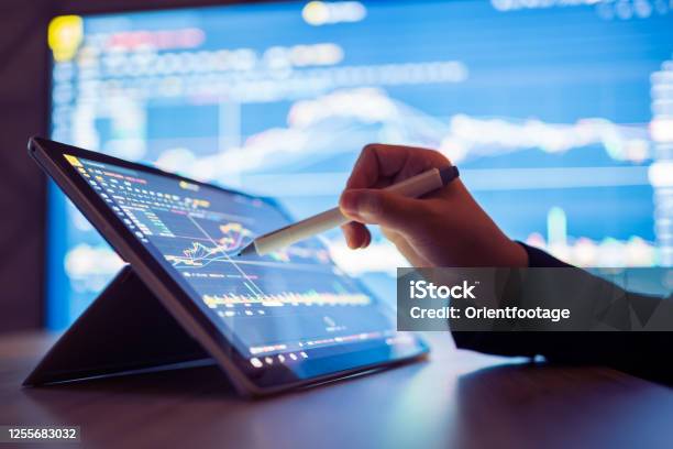 Woman Looking Stock Market Data On Smart Phone Stock Photo - Download Image Now - Data, Technology, Finance