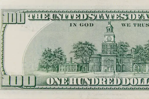 Photo of Macro shot of one hundred dollars bill