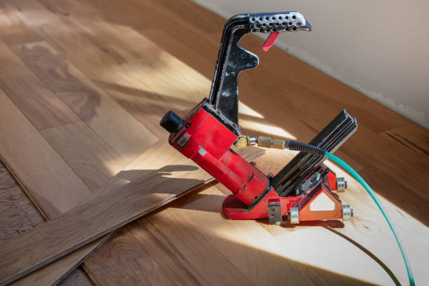 istock Pneumatic Nailer on hardwood flooring 1255685380