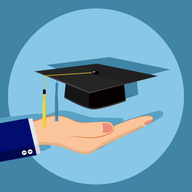 istock graduation cap in hand. Concept of business study. abroad educational. Back to School eps 1255686167
