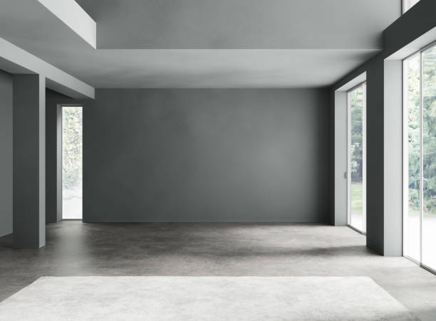 istock Space empty room with concrete floor, large windows. Sunlight shining into the room. 3d illustration 1255689474