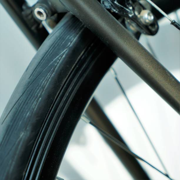 istock Close up view on road bicycle wheel 1255689505