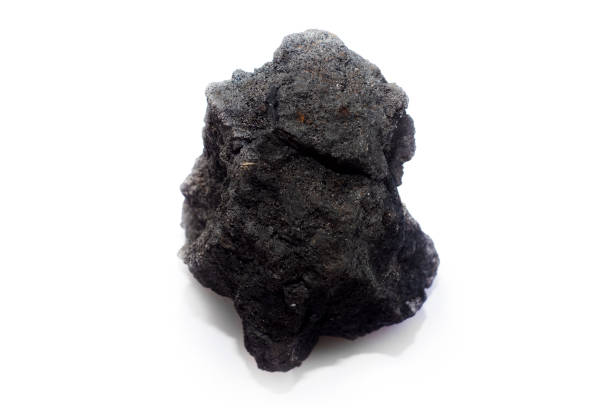 istock A piece of black coal from the mine on a light background. 1255695547