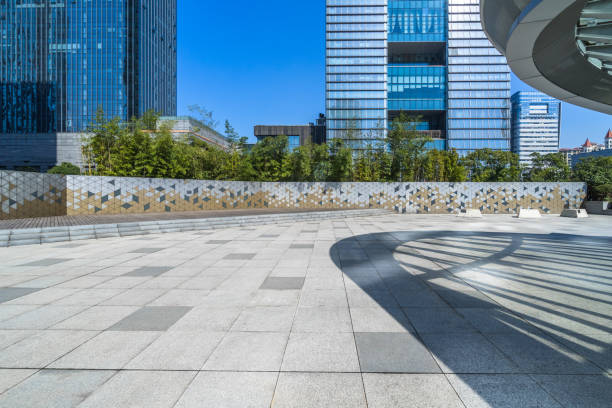 istock modern buildings and empty pavement in china 1255698409