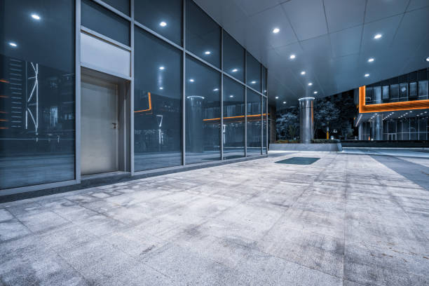 istock empty brick road nearby office building, china 1255698475