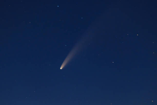 istock Comet Neowise in the dark night sky after sunset 1255699929
