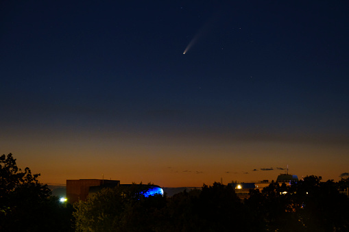 Comet Neowise C 2020 F3 in the dark night sky over Zwolle in The Netherlands on July 11, 2020. The comet is showing a trail