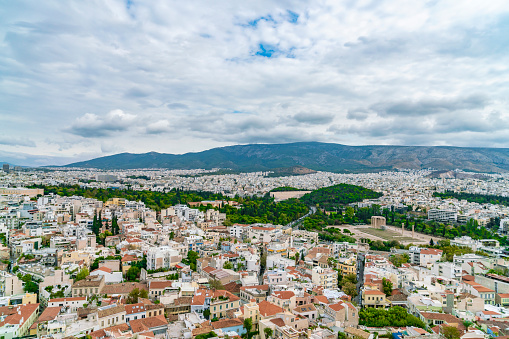 View of the main attraction of the city, the Acropolis. City landscape. Athens, Greece.