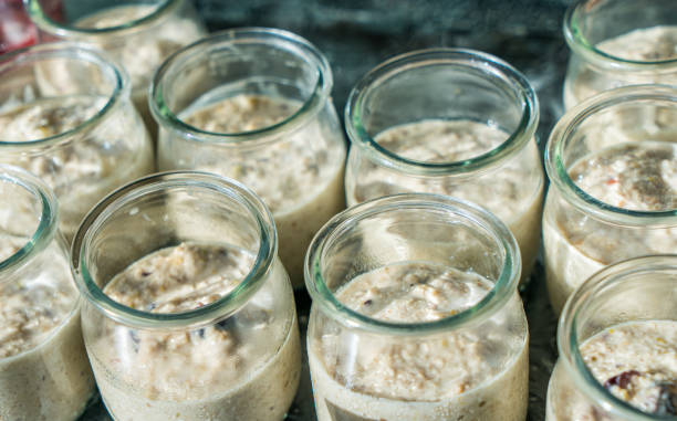 istock Healthy bircher muesli in jars ( Swiss oatmeal) 1255703758