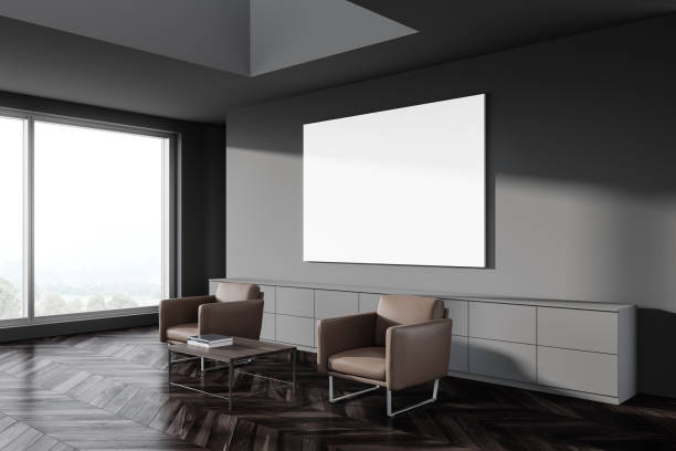 istock Grey waiting room corner, armchairs and poster 1255704006