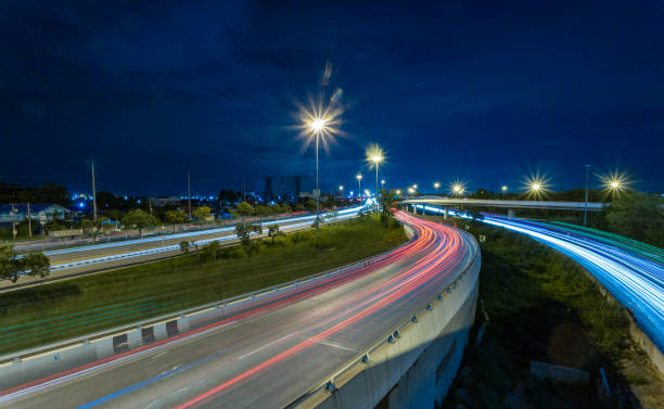 istock Long-exposure roads and bridges at night 1255705949