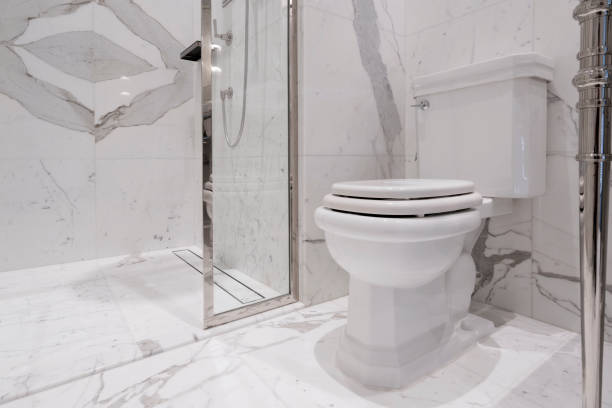 istock interior toilet design with white marble stone and accessory fitting home design concept 1255707484