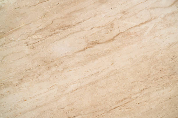 istock beautiful beige shade color marble stone texture background 1255707524