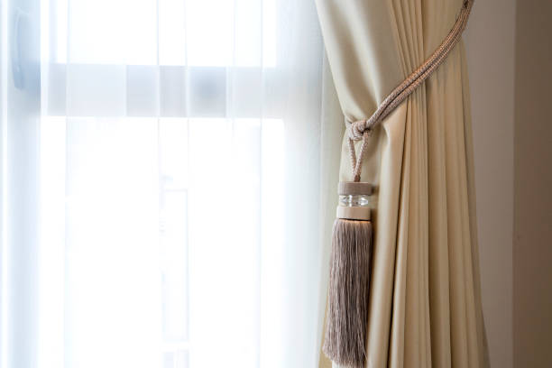 istock soft brown curtain with morning light from window bedroom interior background home beautiful ideas concept 1255707578