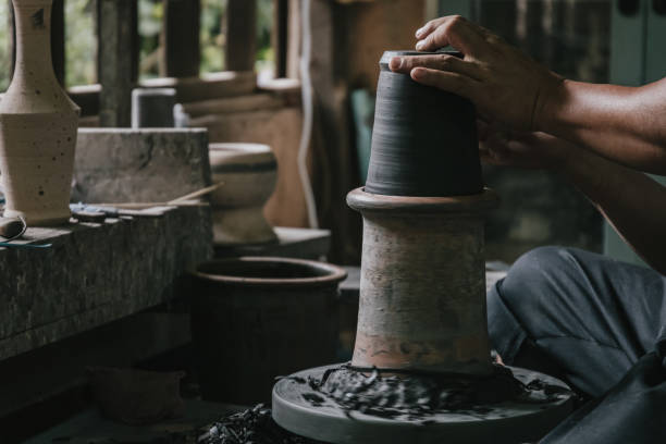 istock Artisan potter making art pot handicraft 1255708856