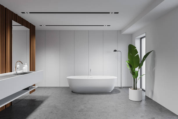 istock White and wooden bathroom, tub and sink 1255709534