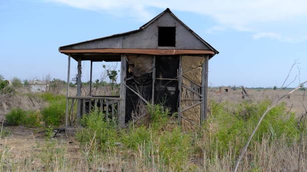 istock Abandoned houses on personal plots 1255710960