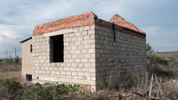 istock Abandoned houses on personal plots 1255711030