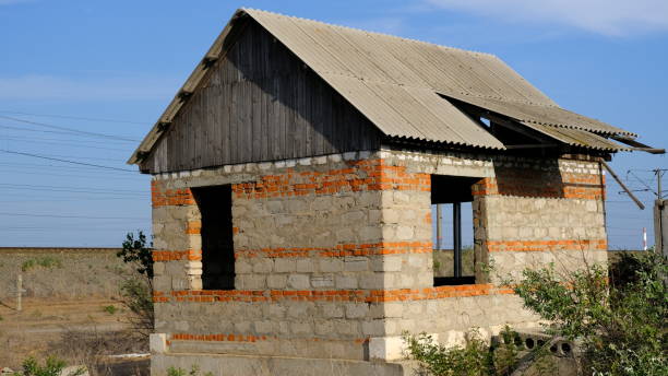 istock Abandoned houses on personal plots 1255711035