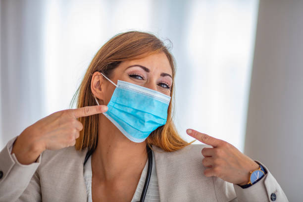 istock Woman wearing protection face mask against coronavirus. 1255711977