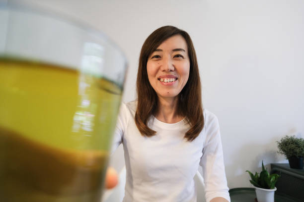 istock Asian woman toasting on virtual happy hour 1255714825