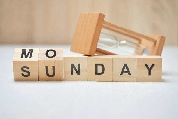 istock Mon and sunday change on wooden blocks. 1255718180