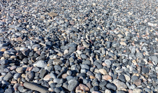 istock Pebbles background.Gravel background.Colorful pebbles background 1255720257
