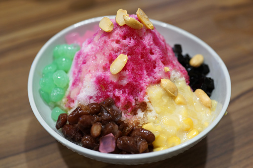 Delicious frozen treats made of shaved ice, grass jelly, colored syrups, and finally topped with lightly sweetened.
