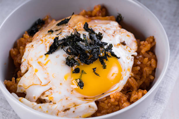 kimchi fried rice with fried egg and nori famous Korean food, kimchi fried rice with fried egg and nori Kimchi stock pictures, royalty-free photos & images