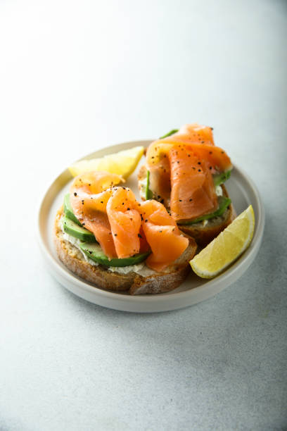 istock Smoked salmon on toast 1255730442