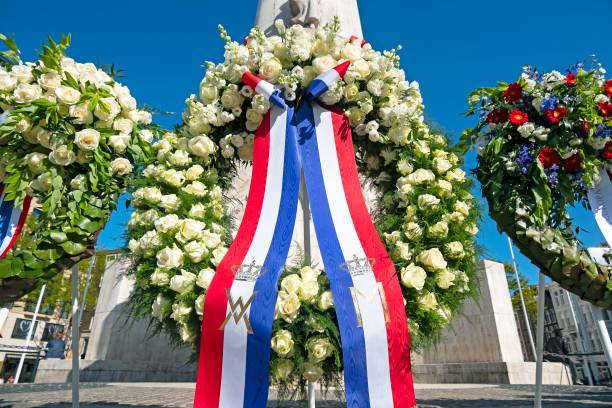 wreaths at the national monument on the occasion of remembrance of the worldwar ii in amsterdam the netherlands - worldwar ii imagens e fotografias de stock