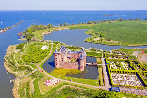 Muiden, Netherlands - May 10, 2020: Aerial view from medieval castle 'Muiderslot' in Muiden the Netherlands