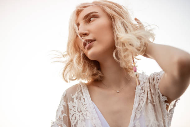 istock Elegant female on windy day in nature 1255731287